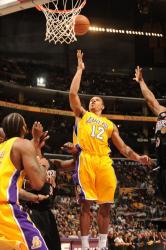 Shannon Brown puts up a layup inside.jpg