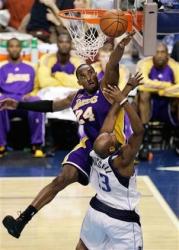 Kobe acrobatic block of Trenton Hassell.jpg