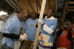 Kobe Bryant and Chris Paul work on a New Orleans house during All Star 2008 Weekend.jpg