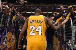 Kobe Bryant fives fans.jpg