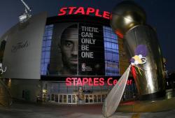 The jumbotron outside the Staples Center shows Kobe Bryant There Can Only Be One.jpg