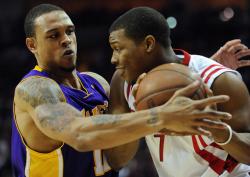 Shannon Brown guards Kyle Lowry tightly.jpg
