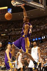 Kobe Bryant monster dunk picture with face expression against Denver.jpg