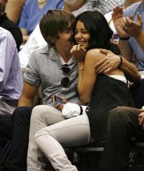 Laker fans Zac Efron kisses Vanessa Hudgens at a Laker game.jpg