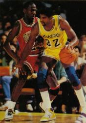 Magic Johnson backs in against Michael Jordan.jpg