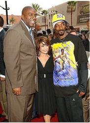 Magic Johnson with Paula Abdul and Snoop Dog.jpg