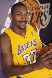 Ron Artest smiles in a Lakers jersey.jpg