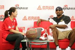 Ron Artest and Chinese hostess in China.jpg