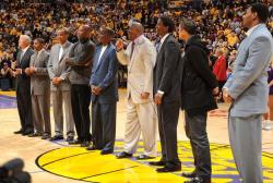 Magic Johnson on the microphone during 2009 opening night along with Jerry West, Norm Nixon, Wilkes, Worthy, Cooper, AC Green, R
