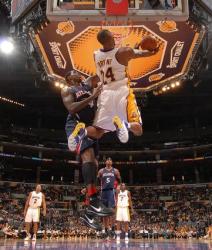 Kobe Bryant goes reverse layup against the Hawks.JPG