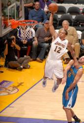Shannon Brown uses Stojakovic and goes for for a monster dunk.JPG