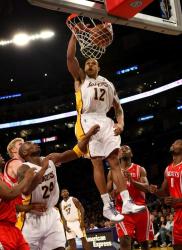 Shannon Brown rises high for a dunk vs the Rockets.JPG