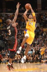 Kobe Bryant elevates over Dwayne Wade for the game winning 3 pointer.JPG