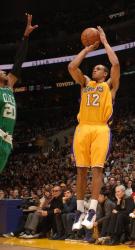 Shannon Brown elevates over Ray Allen for a jump shot.JPG