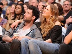 Laker fan Adam Levine and girlfriend attend a Laker game at Staples Center.JPG
