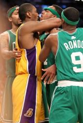 Ron Artest gets up close and personal with Paul Pierce.JPG