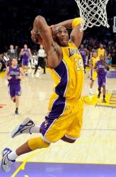 Kobe Bryant flying 2 handed tomahawk slam dunk with the tongue out.JPG