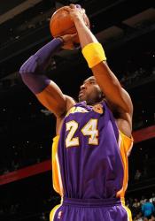 Kobe Bryant jump shot shooting form in Lakers road jersey.JPG