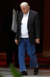 Jerry Buss in black jacket and jeans after a meeting with fellow NBA owners.JPG