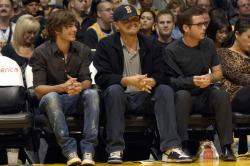 Laker fans Leonardo DiCaprio sits with Zac Efron and Kevin Connolly.jpg