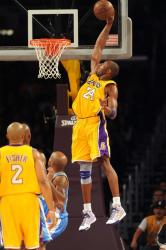 Kobe Bryant goes sky high for a one handed stuff.jpg