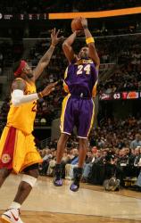 Kobe Bryant elevates and shoots a jumper over Lebron James.jpg